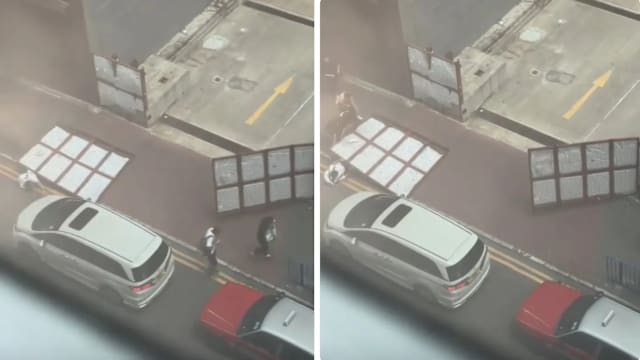 “红霞”未至强风先逞威 吹塌香港工地铁闸压伤路人