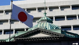 Japan ruling party approves plans to beef up intelligence