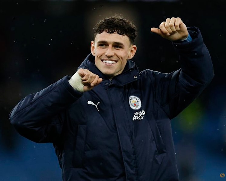 Guardiola hails Foden's spark as Man City stay on Arsenal's heels