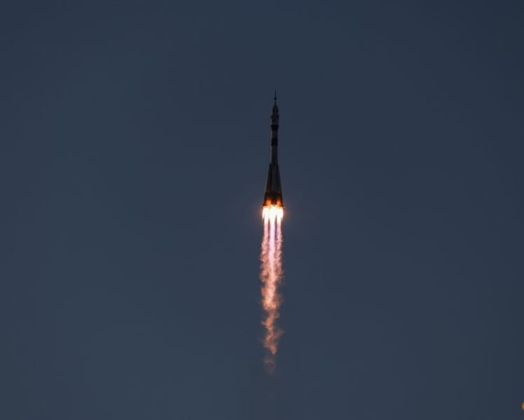 Russia sends American and two cosmonauts to space station with rare NASA chief visit