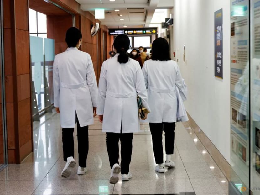 Medical workers walk at Severance Hospital in Seoul, South Korea, on Feb 21, 2024.