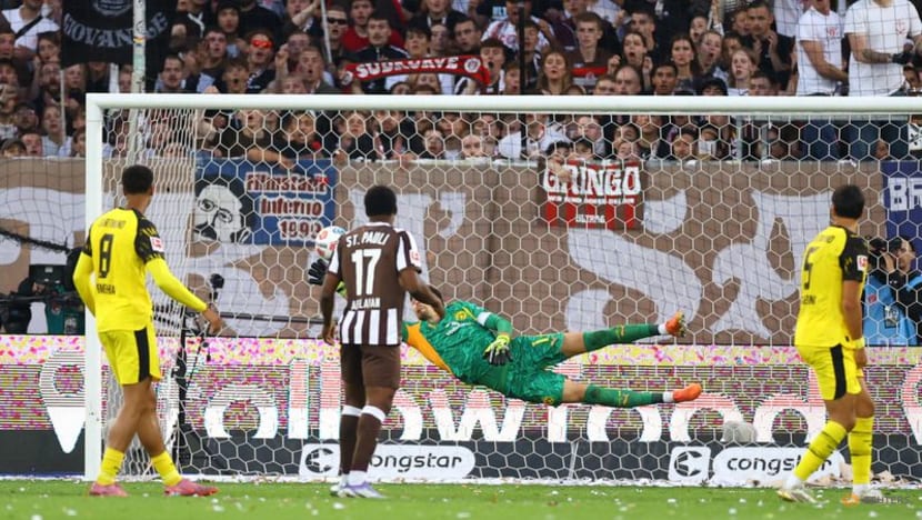 Dortmund concede two late goals to draw 3-3 at St Pauli in Bundesliga opener Dortmund concede two late goals to draw 3-3 at St Pauli in Bundesliga opener