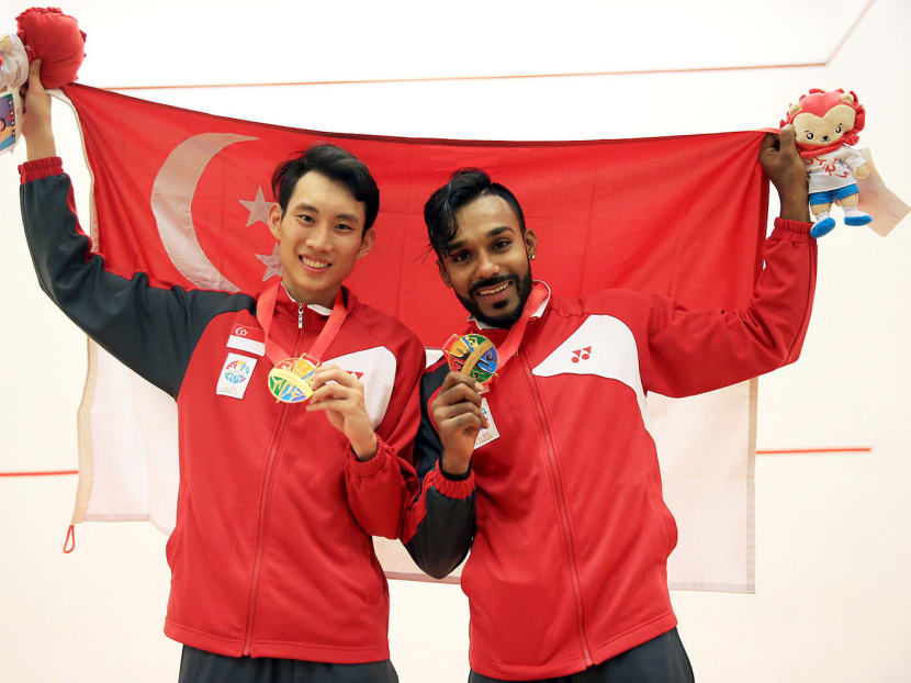 Best friends Marcus Phua (left) and Vivian Rhamanan clinched Singapore’s 83rd gold medal with victory in the men's jumbo doubles. Photo: Wee Teck Hian