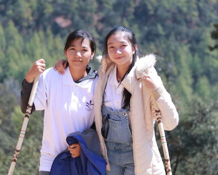 Young Cambodian women on green mission to build roads with plastic waste