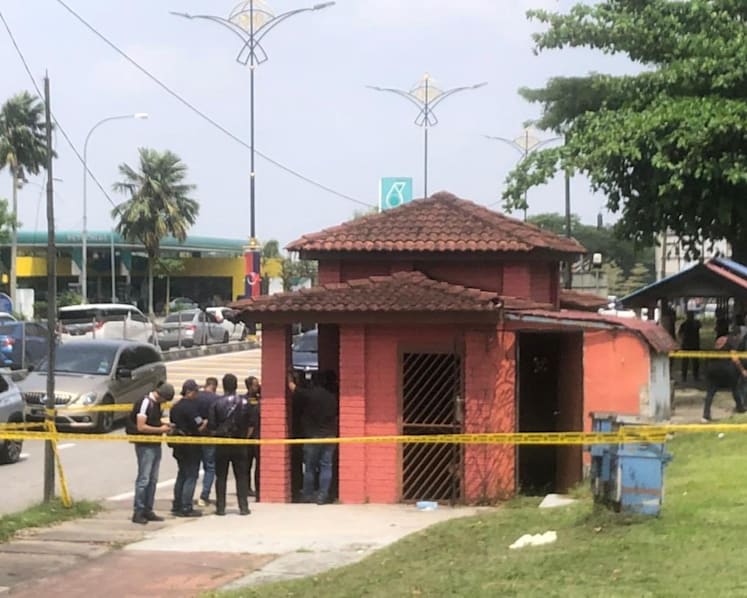 Decomposing body found stuffed inside suitcase at abandoned Johor bus stop