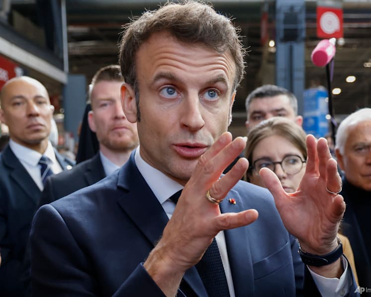 Macron defends contested pension plan at French farm fair