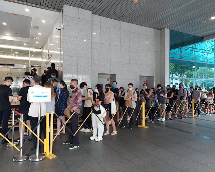 'I have a backache now': People wait for hours to collect passports at ICA building 
