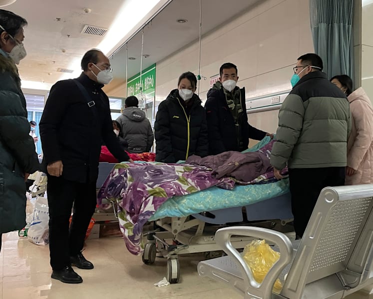 Packed ICUs, crowded crematoriums: COVID-19 roils Chinese towns