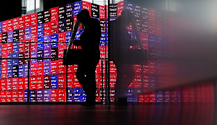 Stocks skid in Asia, bonds buckle as oil climbs