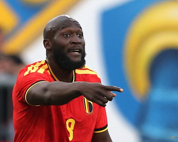 Belgium coach seeks to temper Lukaku fever