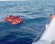  Rescuers comb waters near Bali for 5 missing after ferry blaze