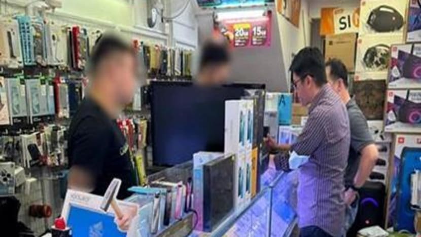 3 arrested at handphone shops over fraudulent registration of postpaid SIM cards for potential criminal use