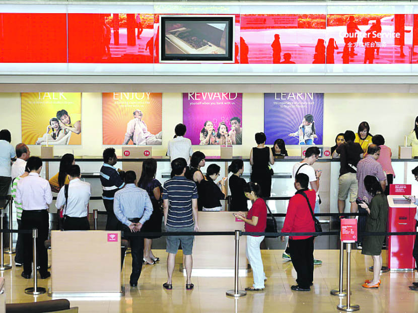 Banks such as OCBC reiterated their commitment to ensuring the development of Singaporean talent. Photo: Bloomberg