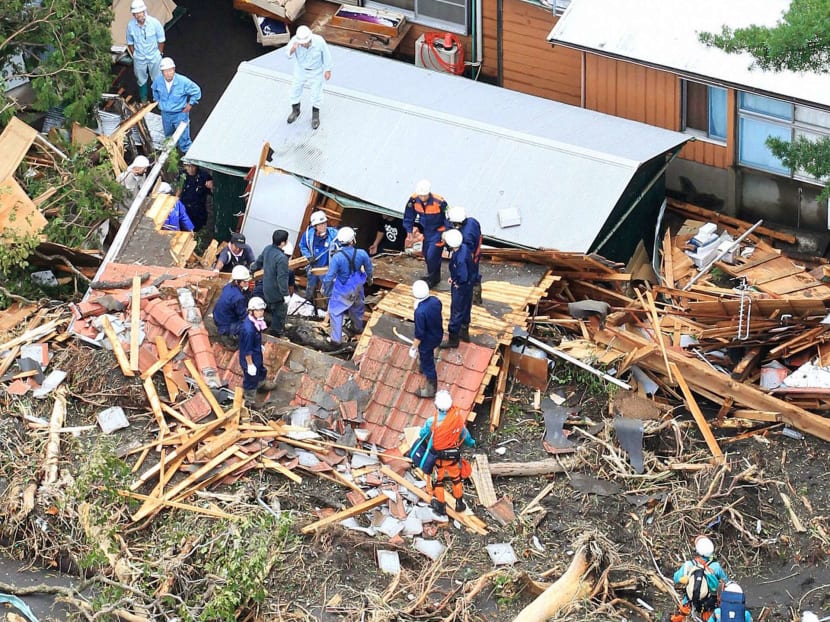 Typhoon, mudslides kill 17 in Japan