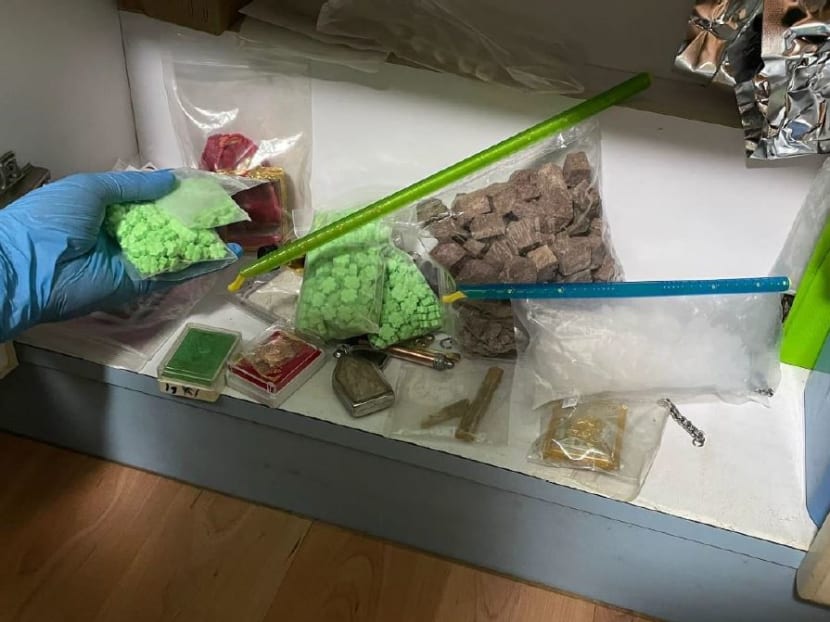 A photo of some of the controlled drugs — including cannabis, heroin, Ice, and Ecstasy tablets — seized from a residential unit near Punggol Field during an anti-narcotics operation conducted on Feb 21, 2023.