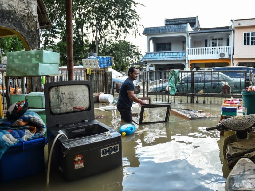 Some in Malaysia’s flood-prone areas question move to hold election during the monsoon Some in Malaysia’s flood-prone areas question move to hold election during the monsoon