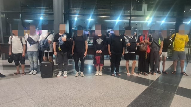 再13名马国获救“猪仔”返回马来西亚 90人等待遣返