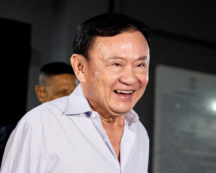 Thailand's influential ex-premier Thaksin Shinawatra leaves country amid turmoil