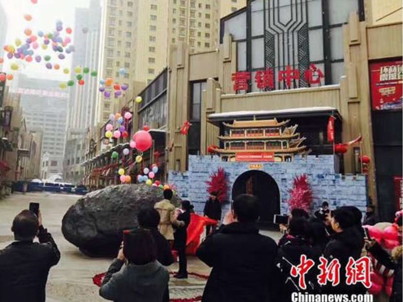 A man in far western China proposed to his girlfriend by unveiling a 33-tonne “meteorite” placed in a public square. Photo: Handout via South China Morning Post
