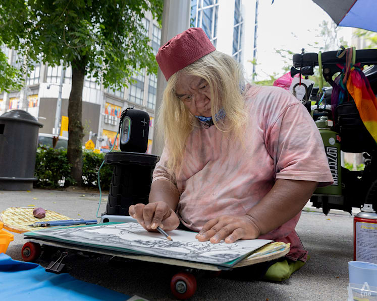 The para-athlete who once won a medal for Singapore and now sells art on the streets of Kuala Lumpur