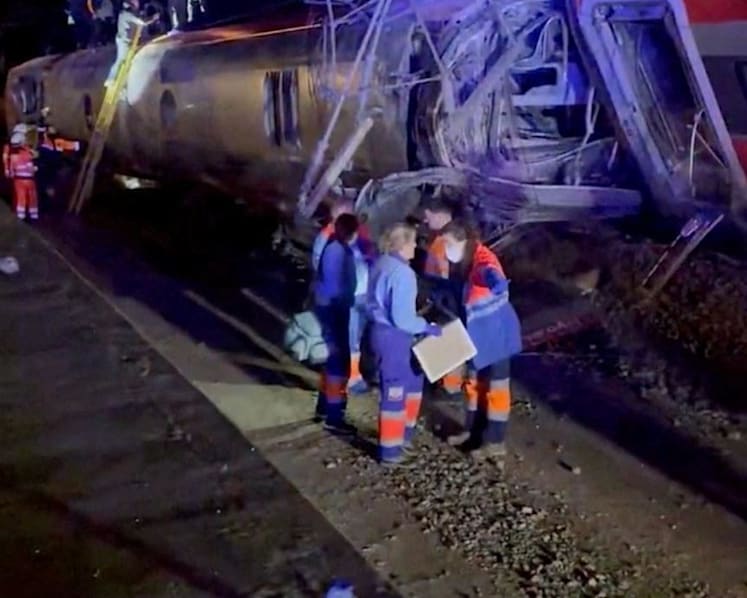 Two high-speed trains derail in Spain, police sources say 21 people killed
