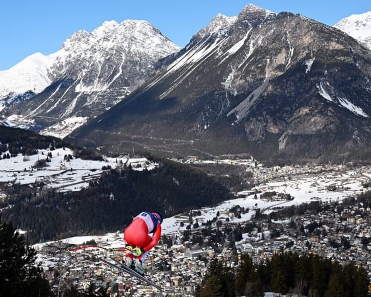 Alpine skiing-Von Allmen strikes gold again with more than a little help from his friend