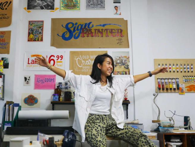 From bars and hotels to Novena Church, she does traditional sign painting in Singapore