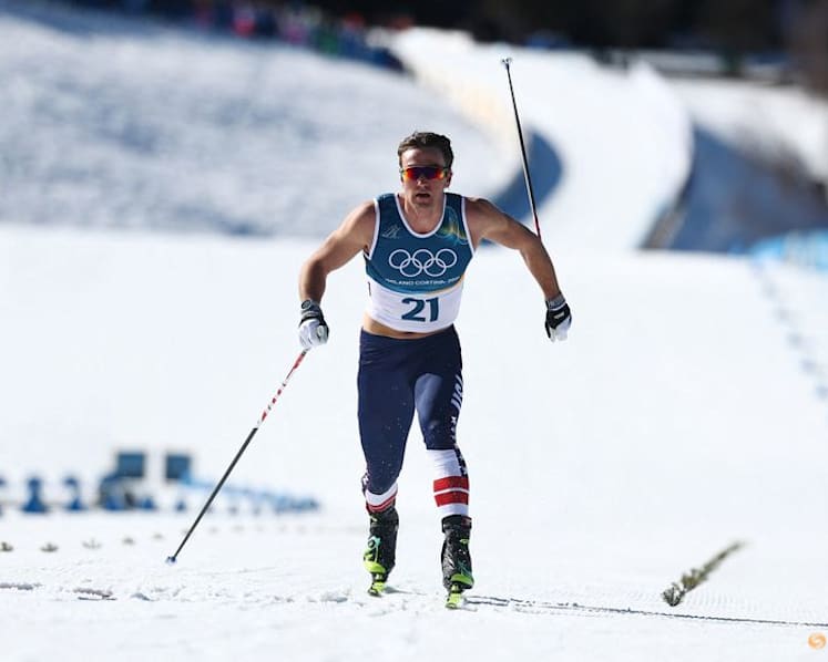 Crosscountry-Broken skis, shirtless racers as erratic weather causes havoc