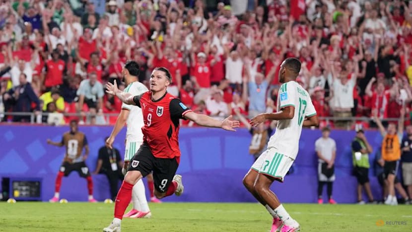 Austria draw with Algeria in World Cup thriller to progress and send Iran home