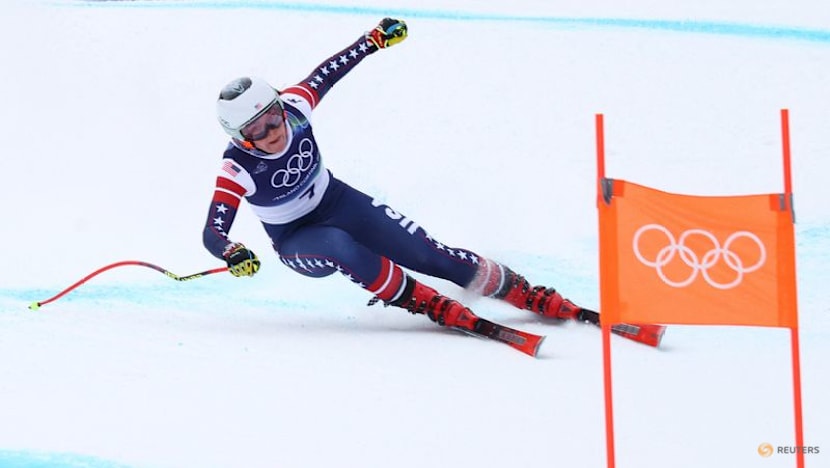 Alpine skiing-Johnson fastest, Vonn third in interrupted final training