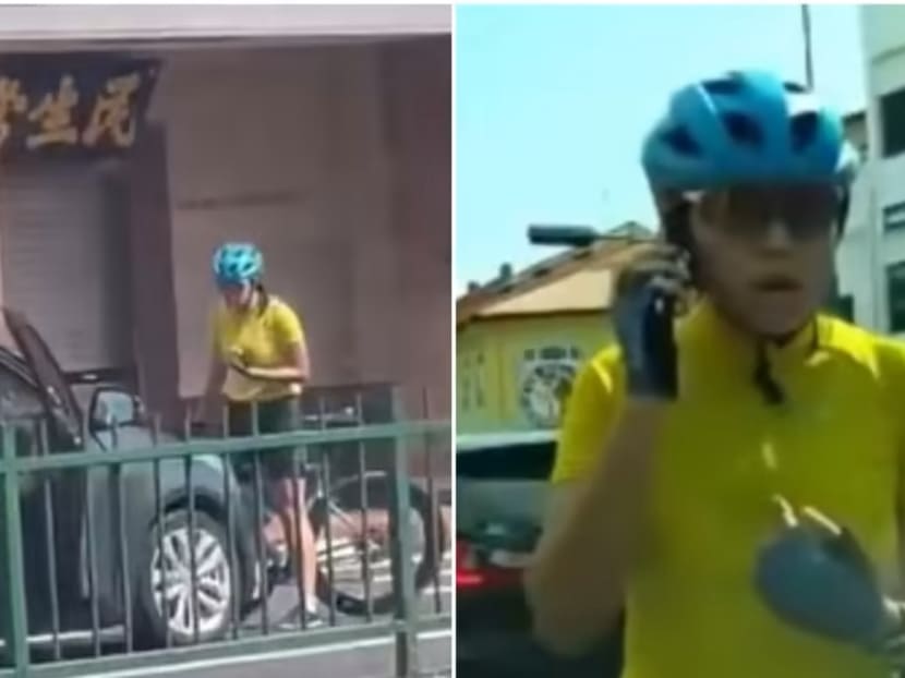 Screengrabs of a video showing an altercation between cyclist Nicolette Tan Shi-en and driver Elaine Michele Ow on June 2, 2023. Screengrabs of a video showing an altercation between cyclist Nicolette Tan Shi-en and driver Elaine Michele Ow on June 2, 2023.