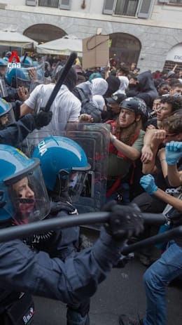 Protesters clash with police, loot shops over 2 days of unrest in Milan