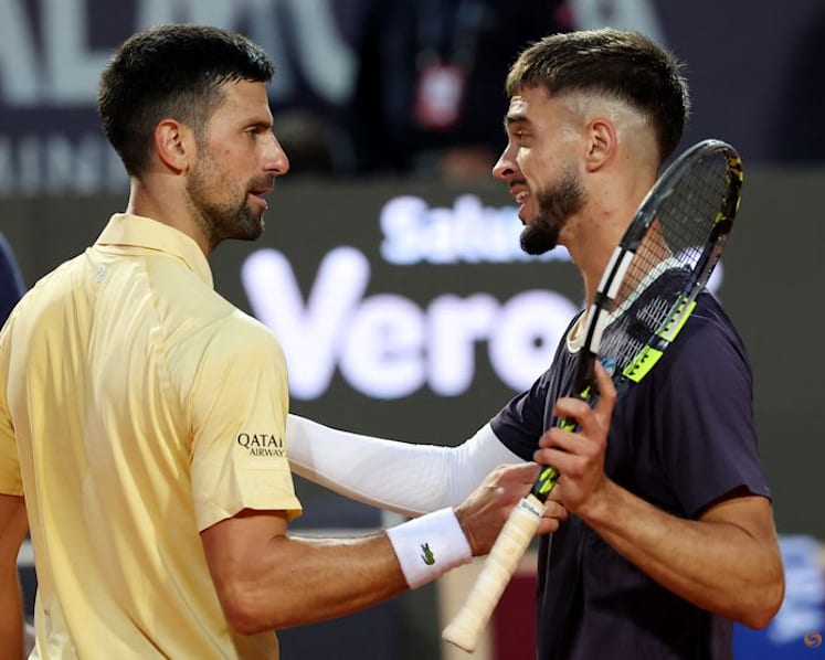 Prizmic stuns idol Djokovic at the Italian Open