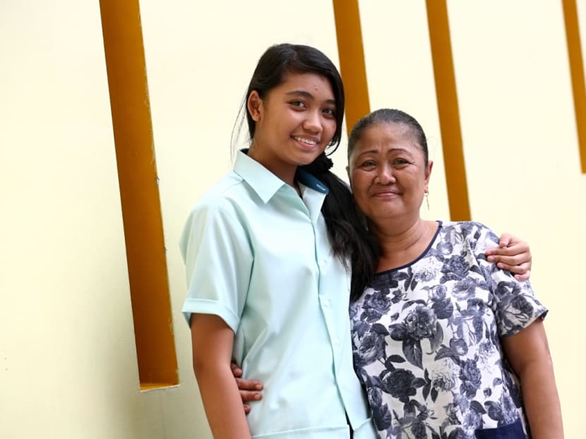 Edusave Merit Bursary recipient Rizmawati Binte Abdul Rasiap, 16, with mother Mdm Rosnah Atan, 55. Photo: Nuria Ling/TODAY