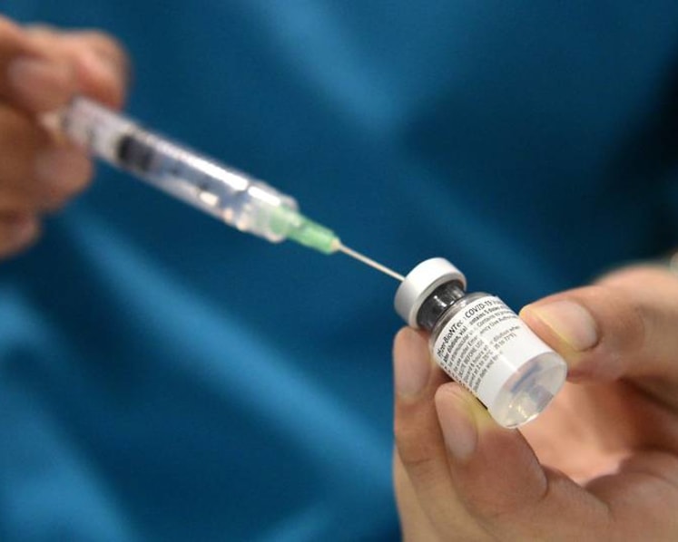Singapore sees rise in COVID-19 cases as authorities say 'periodic' waves are expected