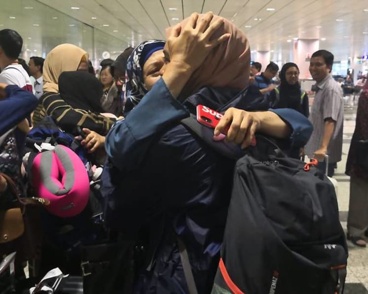 Cheers, tears and hugs as NUS students return from earthquake-hit Lombok