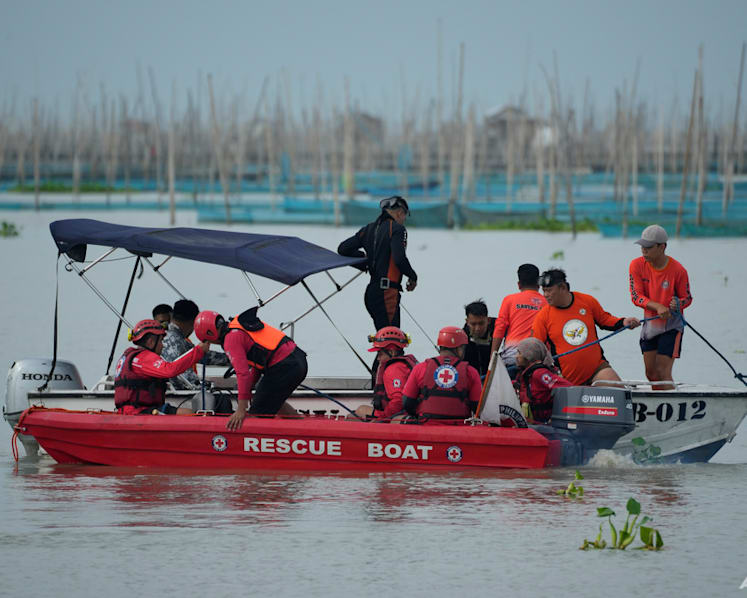 Philippine ferry was overloaded when it flipped over, leaving 26 dead, official says