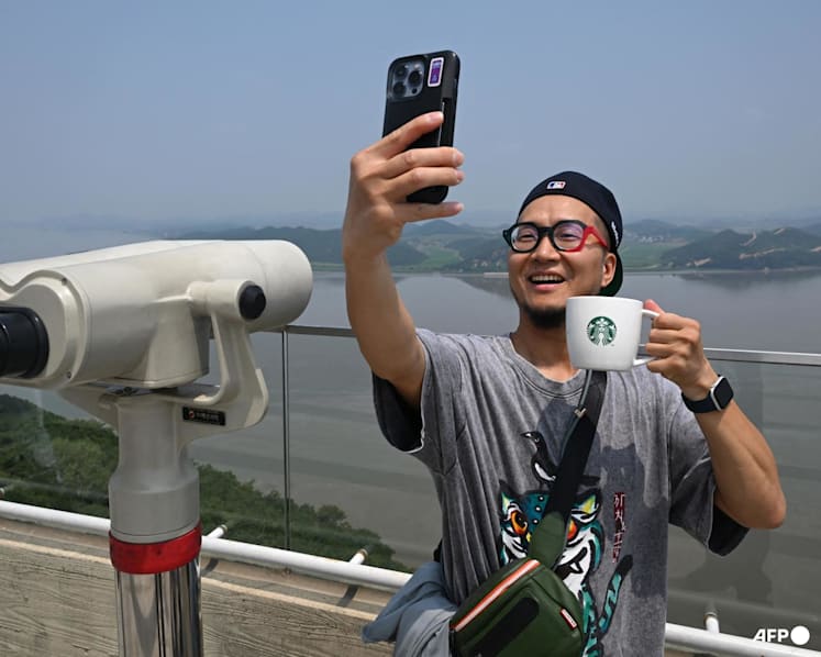 Coffee with a view: Tourists flock to Starbucks overlooking North Korea
