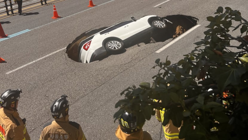 Two injured after sinkhole swallows car in Seoul: Reports