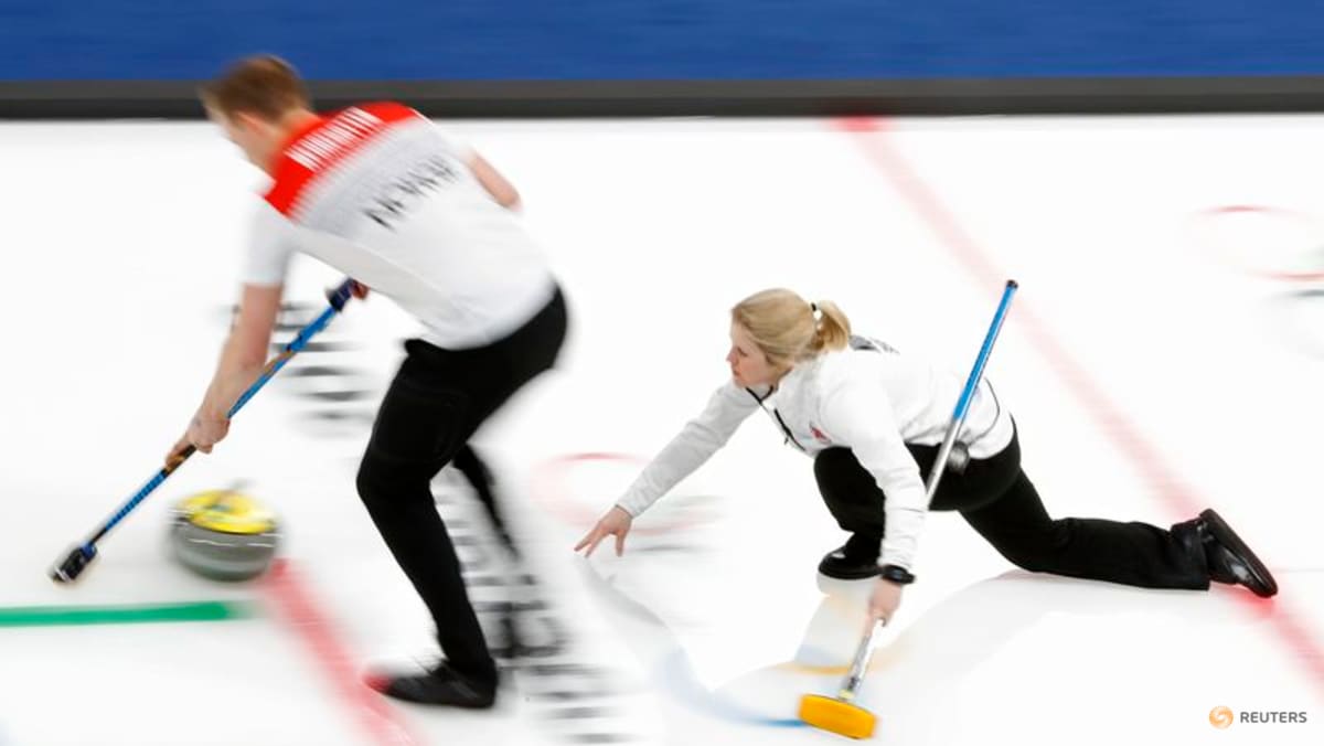 Curling-Married mixed doubles teams balance demands of competition with family life