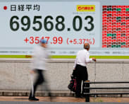 Asian markets temper US-Iran deal optimism as oil prices plunge