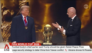World football body awards newly created peace prize to US President Donald Trump at WC draw