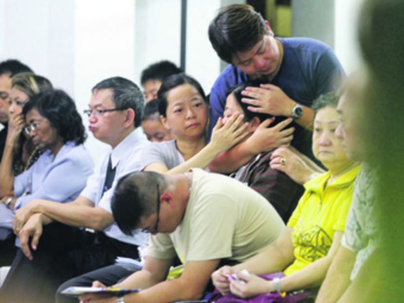 Grieving family members and friends attended the memorial service for Nigel and Donovan yesterday. Photo: Ernest Chua