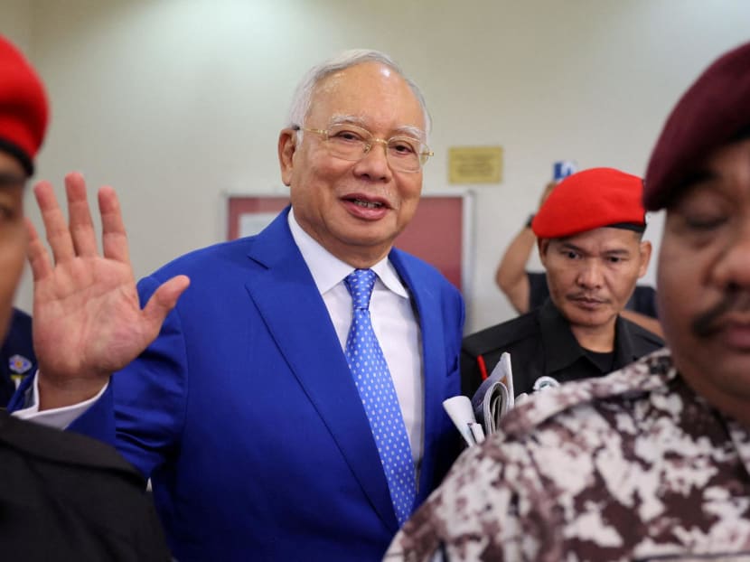 Former Malaysian Prime Minister Najib Razak waves to photographers as he leaves the court after court proceedings in Kuala Lumpur, Malaysia on Jan 19, 2024. Former Malaysian Prime Minister Najib Razak waves to photographers as he leaves the court after court proceedings in Kuala Lumpur, Malaysia on Jan 19, 2024.