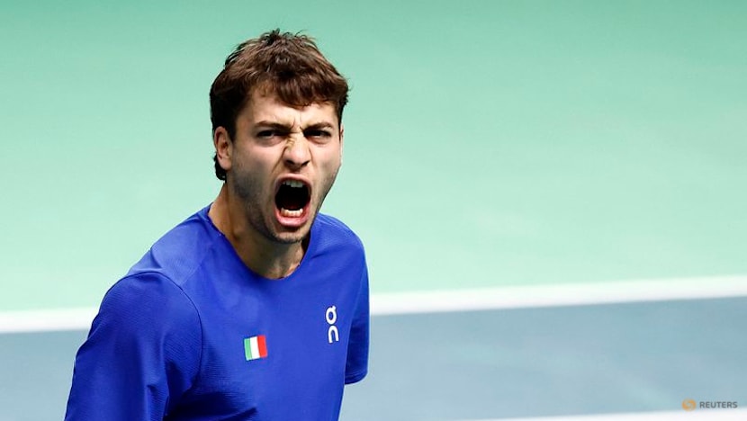 Battling Cobolli sends holders Italy into Davis Cup final