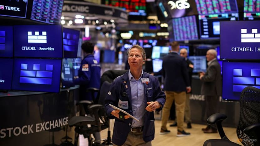 Global shares and dollar higher as markets eye Fed rate cuts