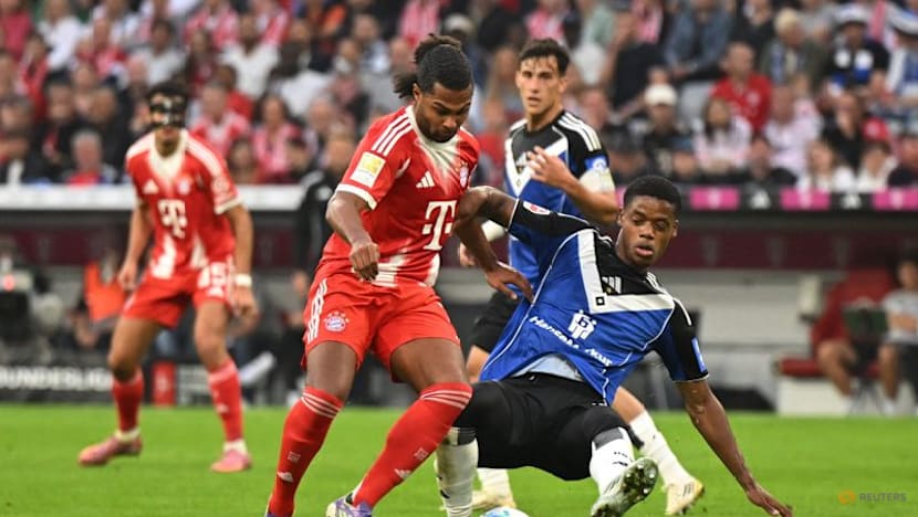 Five-star Bayern crush promoted Hamburg with Kane double