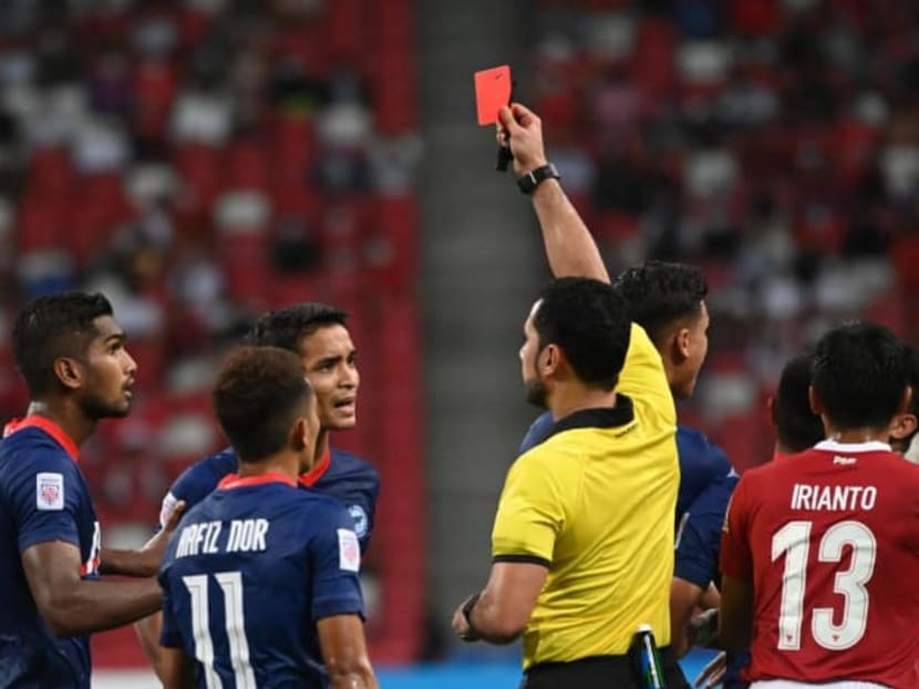 Singapore's Safuwan Baharudin is sent off during his side's AFF Suzuki Cup 2020 semi-final second leg match against Indonesia at the National Stadium in Singapore on Dec 25, 2021. Singapore's Safuwan Baharudin is sent off during his side's AFF Suzuki Cup 2020 semi-final second leg match against Indonesia at the National Stadium in Singapore on Dec 25, 2021.