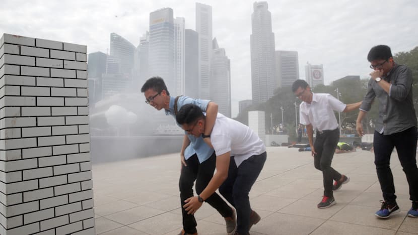 The Big Read: Gunfire on Paris streets sends a jolt halfway around the world