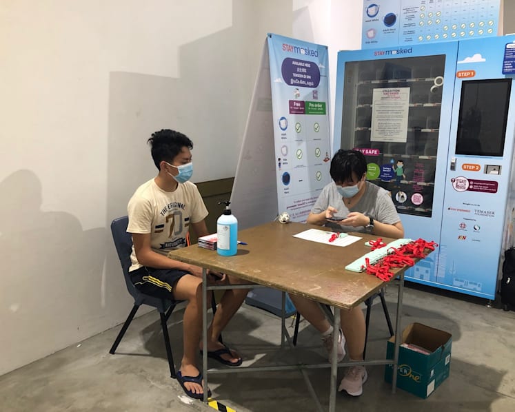 Residents should collect TraceTogether tokens near their homes, says Vivian Balakrishnan, amid rush at some CCs